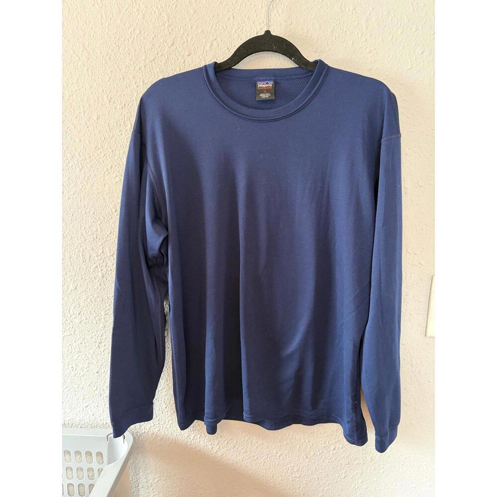 Men's Patagonia Capilene Blue Long Sleeve size L. Several tiny snags but no hole
